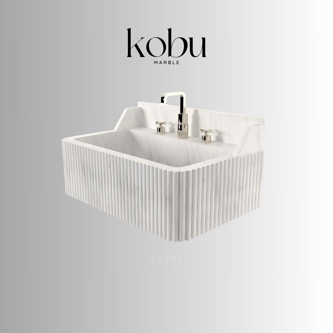 Close-up of handcrafted marble veining on 24-inch wall-mounted sink