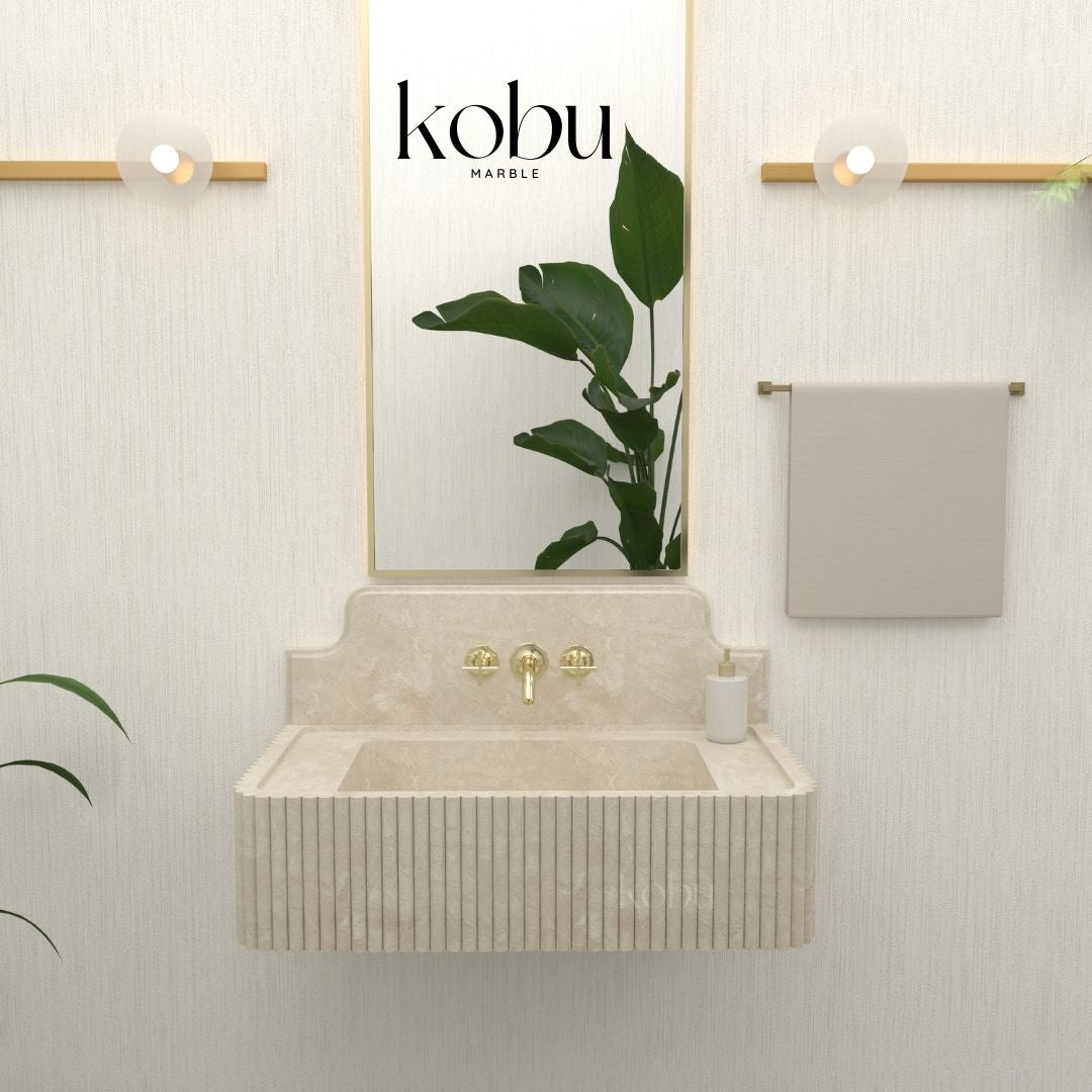 Front view of handcrafted 30-inch fluted travertine sink, showcasing its natural stone elegance
