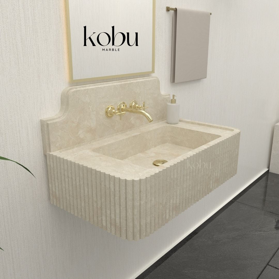 Side angle of a luxury 30-inch travertine fluted sink, highlighting its sculpted exterior and smooth finish.