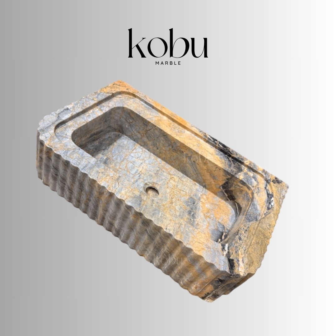 Close-up of natural marble texture on Azure fluted sink