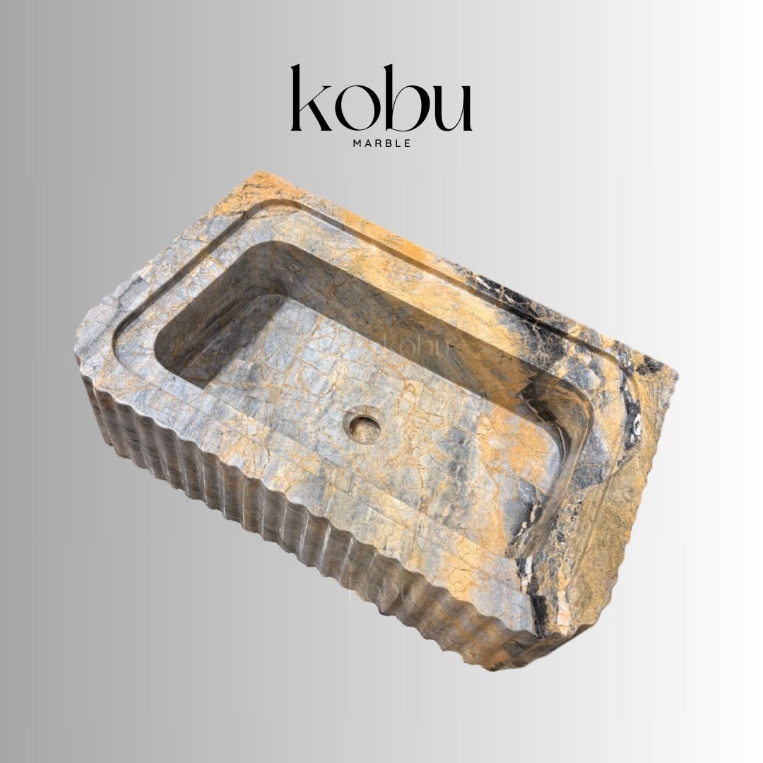 Azure marble sink installed in a serene coastal-style bathroom