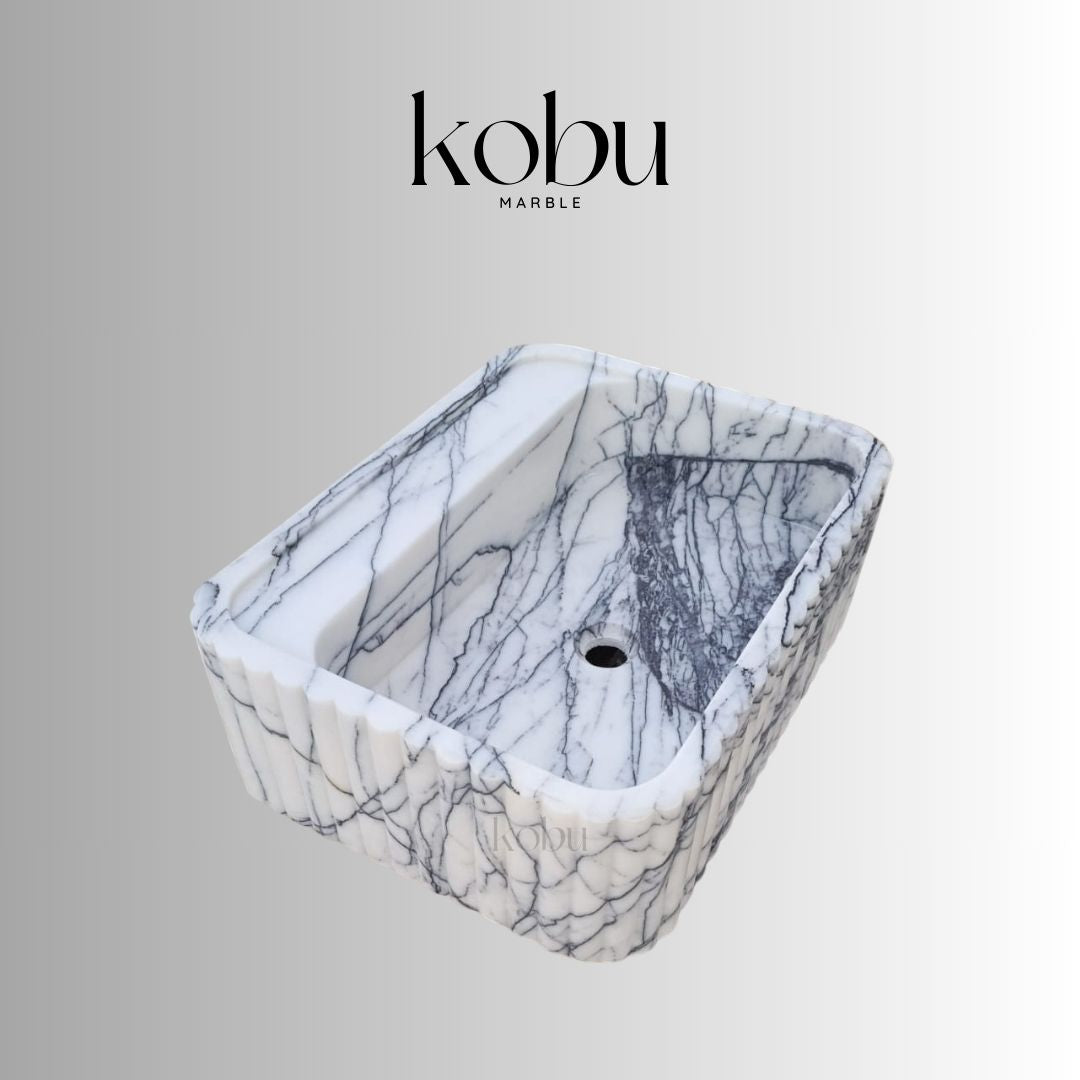 Close-up detail of natural veining in lilac marble sink