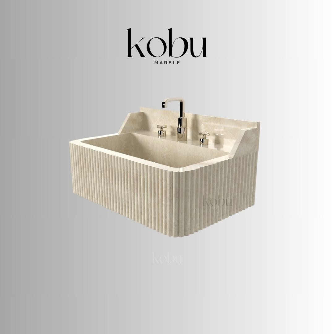 Side profile of handcrafted travertine sink with backsplash for modern bathrooms