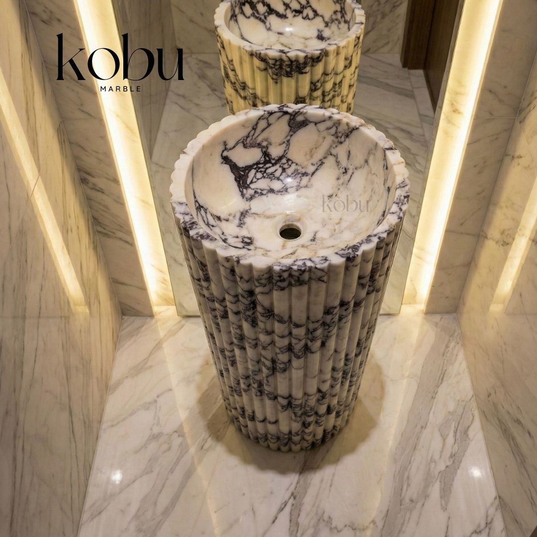 fluted-calacatta-viola-marble-pedestal-sink.jpg