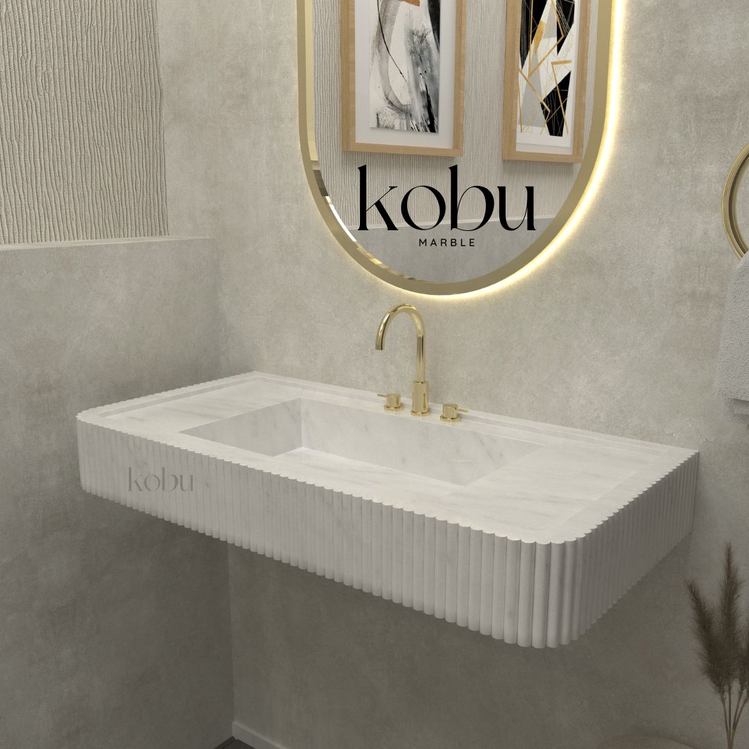 Side angle of luxury fluted white marble sink, perfect for contemporary bathrooms.