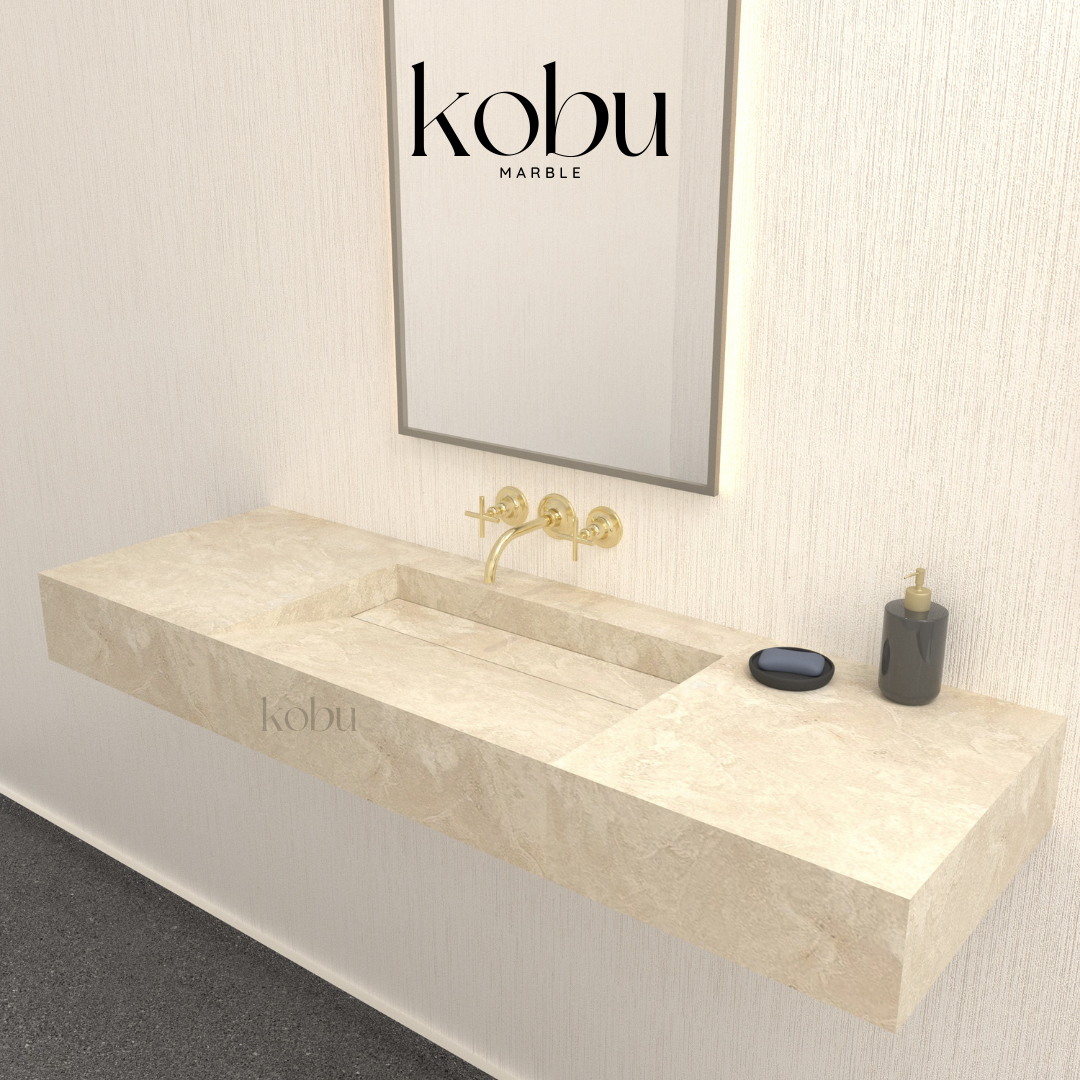 Side view of the sloped travertine sink highlighting its smooth edges and sloped design for efficient water flow.