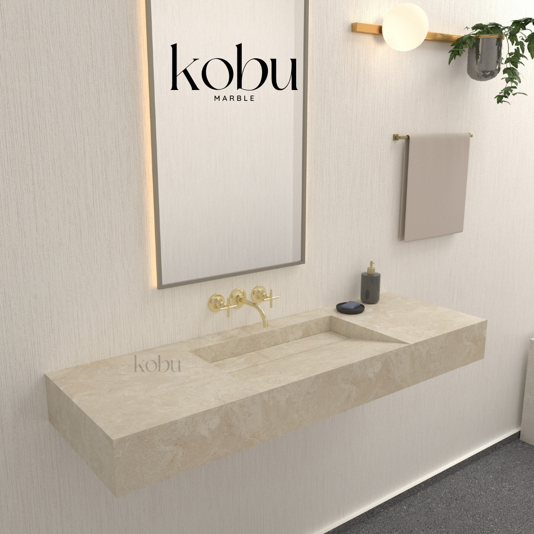 Side view of the sloped travertine sink highlighting its smooth edges and sloped design for efficient water flow.